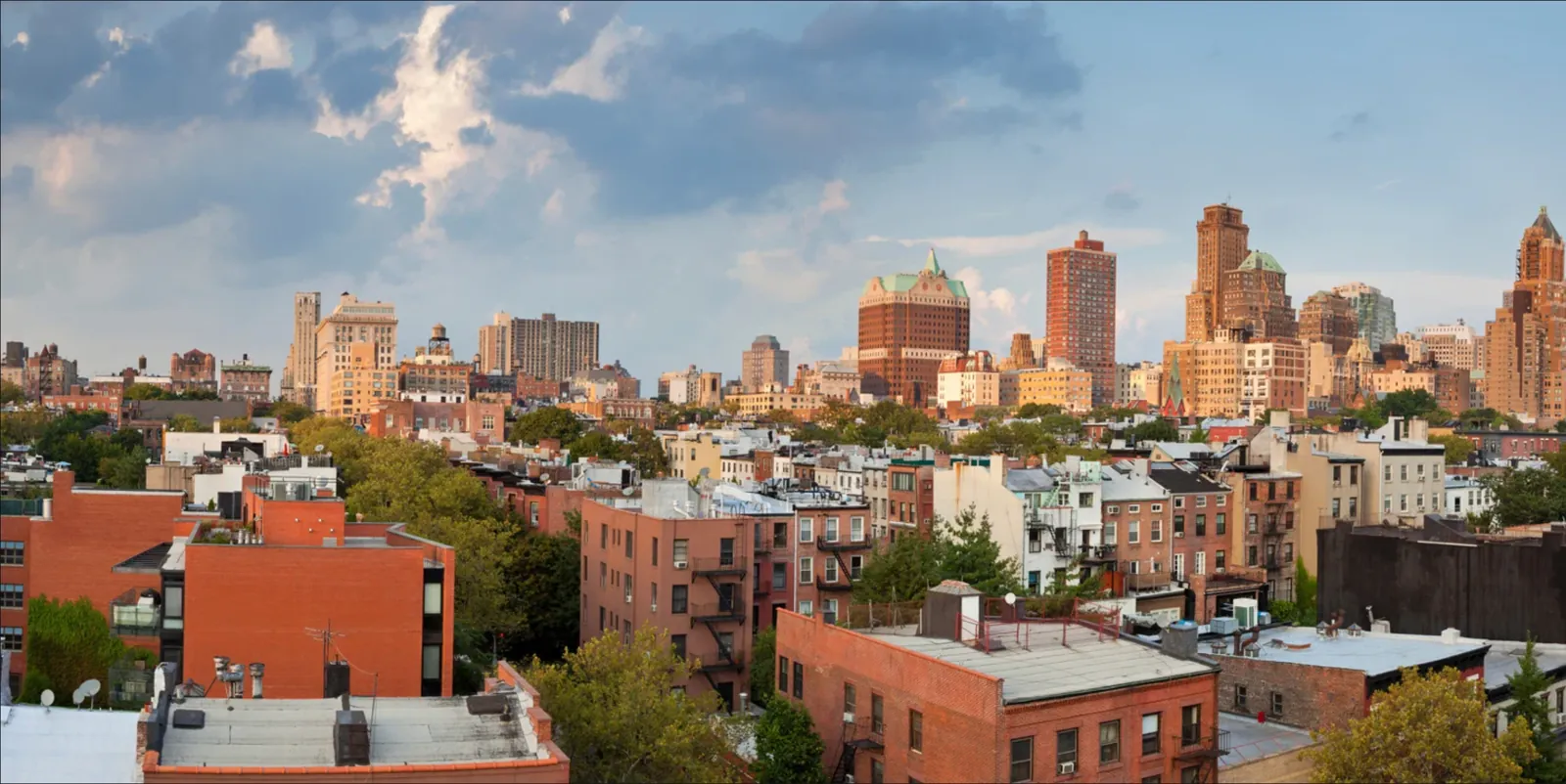 Rooftops and buildings in the supplied Brooklyn Heights neighborhood photograph.